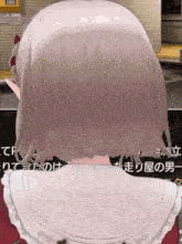 the back of a girl 's head is shown in a video game while talking to someone .