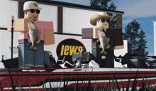two roblox characters holding fish in front of a jew 's sign