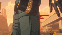 a close up of a person 's pants with spikes on the waist