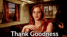 a woman with red hair says thank goodness