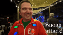 a man wearing a red jacket that says ec on it