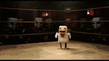 a chicken in a boxing ring with skulls behind it