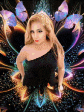 a woman in a black dress stands in front of a colorful background with butterflies