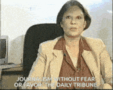 a woman sitting in a chair talking about journalism without fear or favor the daily tribune