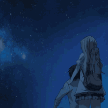 a boy and a girl are looking at the stars with a backpack that says ' i love you ' on it