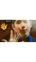 a close up of a person 's hand with the number 5 written on it