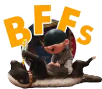 a little boy is laying on top of a dog with the words bffs behind him