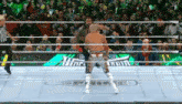 a wrestler in a ring with the word prime on the ground