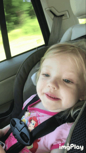 little girl in car seat gif
