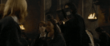 a man is reading a book called harry potter