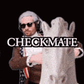 a man standing next to a statue of a horse with the words checkmate written on it
