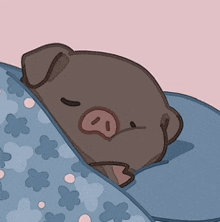a cartoon pig is sleeping on a blue blanket