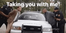 Taking You With Me Cops GIF - Taking You With Me Cops Under Arrest GIFs