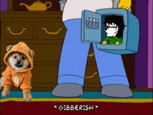 a dog wearing a hoodie with a b on it is standing next to a man holding a box that says gibberish