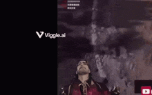a man with long hair and a mustache is on a screen with the words viggle.ai above him