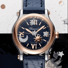 a chopard watch with a blue band and diamonds on the face