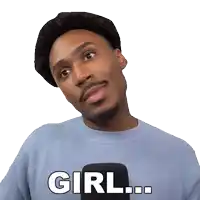 a man wearing a hat and a blue sweater has the word girl written on his shirt