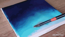 a brush is being used on a canvas that says made in animotica