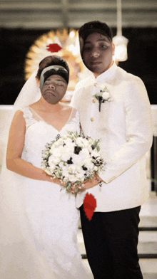 a bride and groom are posing for a picture with their faces on their faces