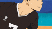 a close up of a person wearing a ics shirt