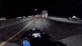 a blurry picture of a person riding a motorcycle