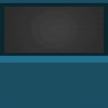 a group of people sitting in front of a screen that is empty