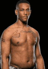 a man without a shirt has a tattoo on his chest that says forgiven