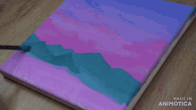 a painting is being painted on a canvas with the words made in animotica on the bottom