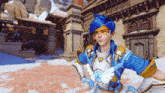 a video game character with blue hair and wings is smiling