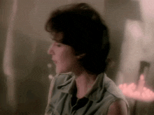 a blurry picture of a woman 's face in a room