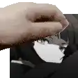 a hand is holding a piece of paper in front of a black and white anime girl .