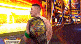 john cena is holding a world heavyweight wrestling championship belt while standing on a stage .