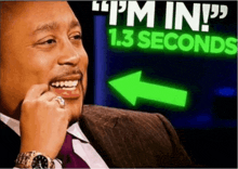 a man says " i 'm in 1.3 seconds " in front of a green arrow