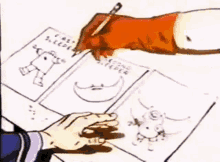 a person is drawing a robot on a piece of paper that says " second sleeper " on it
