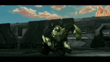 a green robot is standing in front of a building with mountains in the background