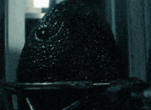 a close up of a black object with the word kepler on the bottom
