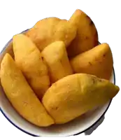 a white bowl filled with fried food with a blue rim