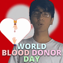 a man stands in front of a heart with the words world blood donor day