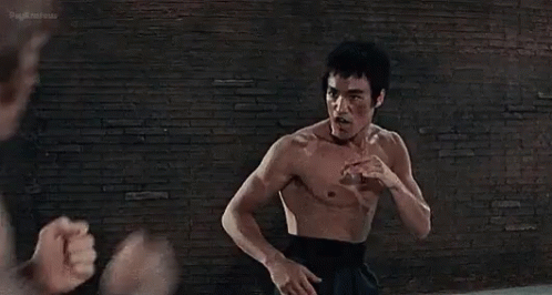 Bruce Lee Chuck Norris GIF - Bruce Lee Chuck Norris Fight - Discover &  Share GIFs