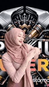a woman wearing a pink hijab stands in front of a poster that says power