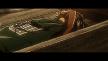 a person laying in a wooden box with a blanket on them
