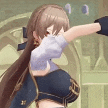 a close up of a girl in a video game with her arm outstretched .