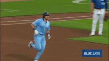 a baseball player in a blue uniform is running on a field with a sign that says home run