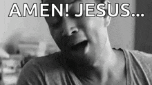 a black and white photo of a man making a funny face and saying amen jesus .
