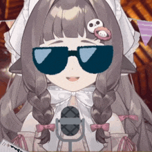 a girl wearing sunglasses stands in front of a microphone with a skull in her hair