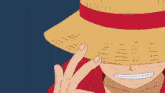 a cartoon character wearing a straw hat is making a funny face