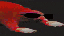 a pixelated image of a person wearing sunglasses and a green shirt