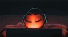 a cartoon character wearing headphones is sitting in front of a laptop computer