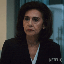 a woman with a netflix logo in the corner of her face
