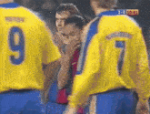 a soccer player with the number 9 on his back